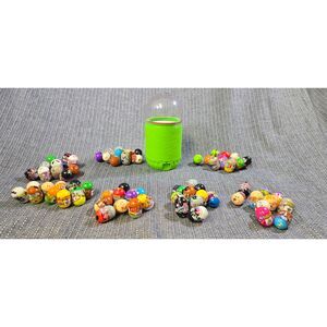Collection of 70 Mighty Beanz and Mighty Beanz Slam Pack